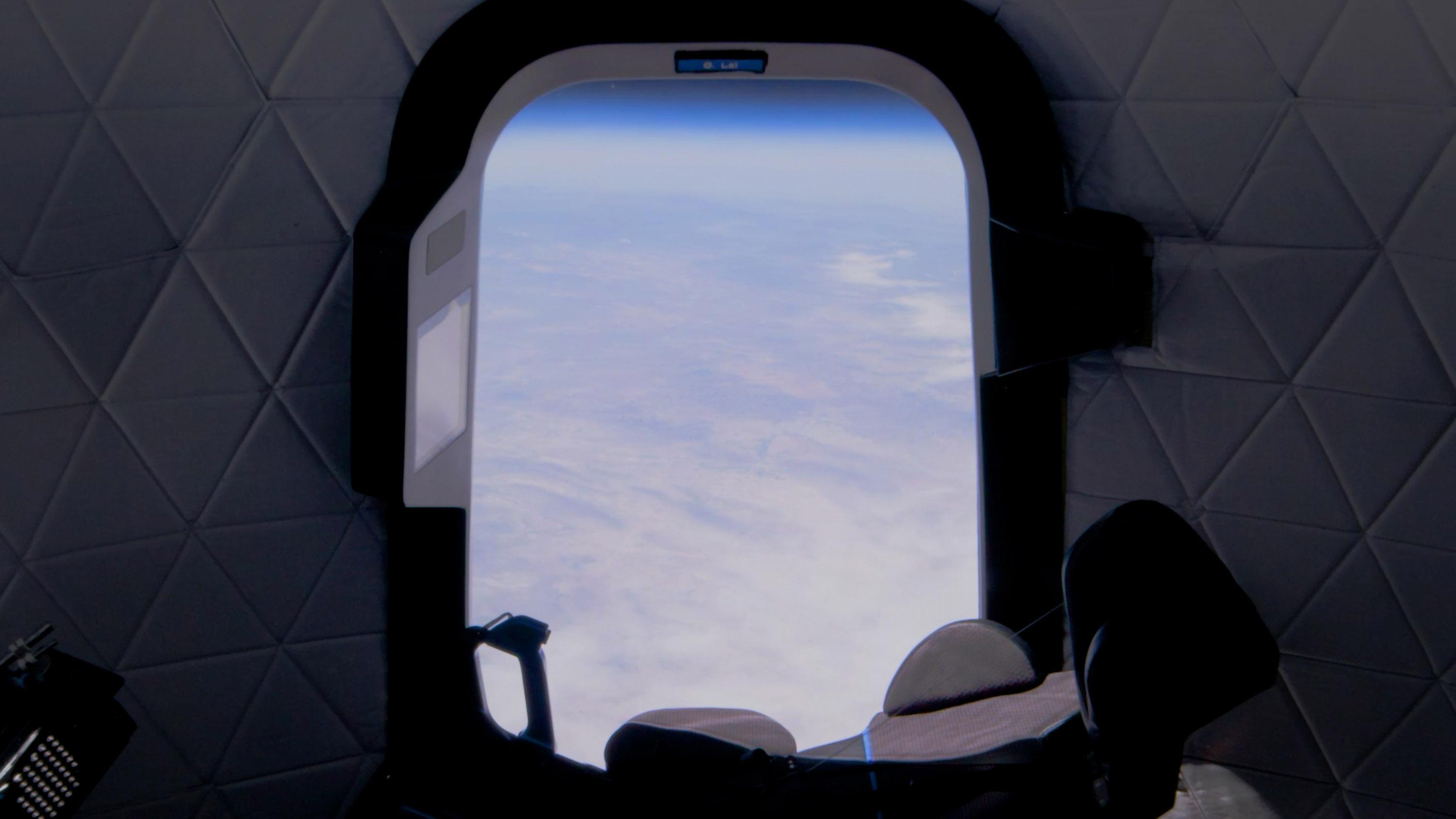 A view of Earth from inside New Shepard.