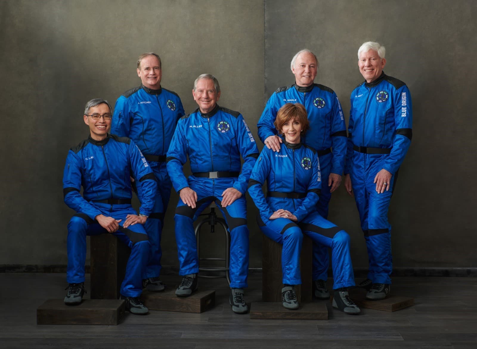 The NS-20 crew poses for their official portrait wearing blue flight suits.