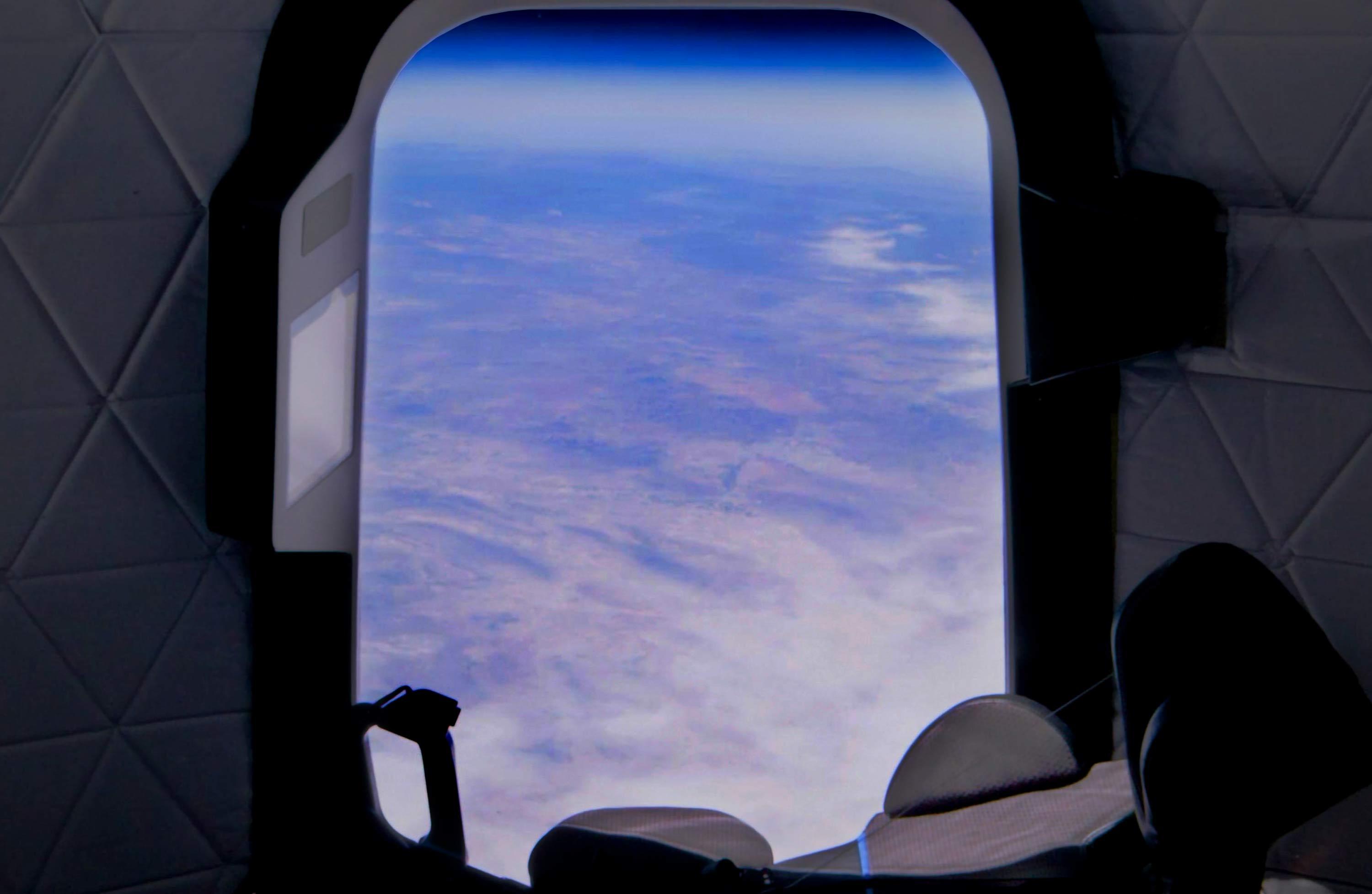 A view of Earth from inside New Shepard.